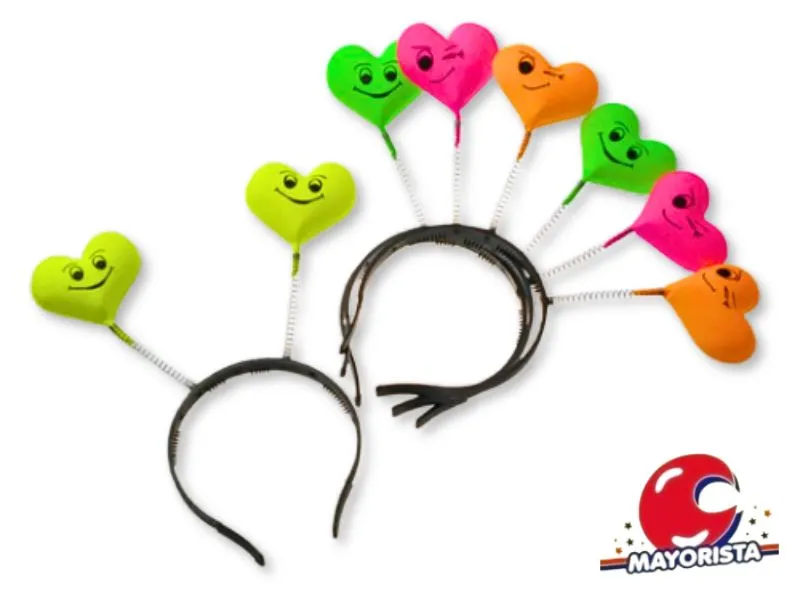 VINCHA RESORTE PLASTICA CORAZON CARITA (5502) TRIGGER PACK